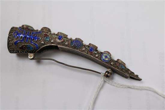 A late 19th/early 20th century Chinese silver filligree, enamel and gem set nail guard, 86mm.